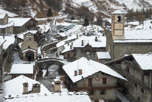 Aerial view of Chianale during winter season, a typical alpine village in Piedmont region, Italy