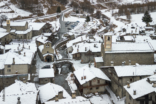 Aerial view of Chianale during winter season, a typical alpine village in Piedmont region, Italy