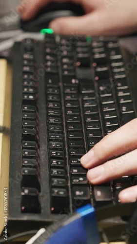 Close-Up of Man Playing Game with Keyboard