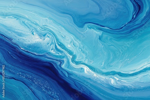 Abstract flowing art with swirling shades of blue. Resembles ocean waves and fluid movement
