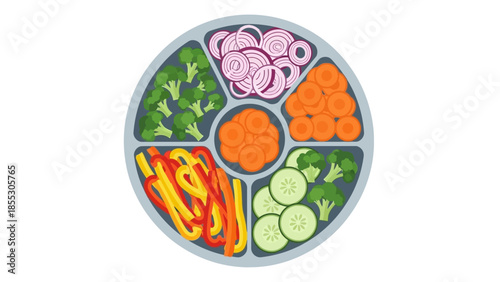 Colorful assortment of fresh vegetables in round tray for healthy meal preparation