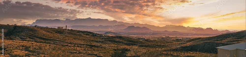 Fototapeta premium A dramatic sunset illuminates the Chisos Mountains in Texas.