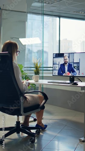 Business woman talking on video conference meeting in the office