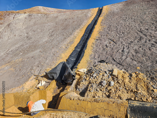 Billede på lærred Construction process of river channels with geosynthetics in mine banks