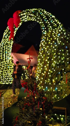 Bright festive entrance, Celebratory walkway decorated with glowing lights and seasonal garlands slow motion