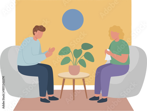 Man and woman engaged in a serious therapy session.