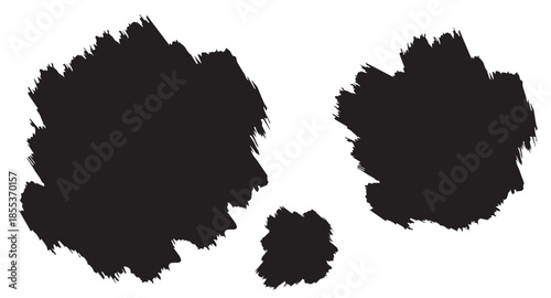 Abstract black inkblot shapes with textured grunge edges on white for artistic design background element