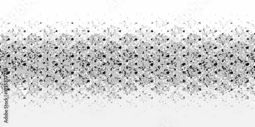 A grainy textured background composed of numerous small dark specks