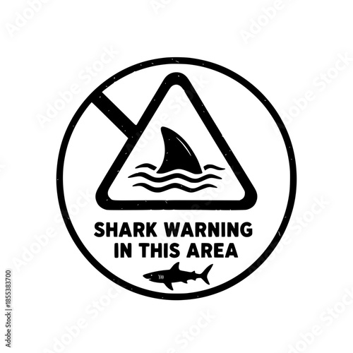 Black and white shark warning sign graphic for marine safety, featuring a prominent fin within a hazard triangle and clear textual alert for aquatic recreation