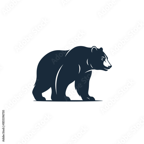 A striking silhouette of a powerful bear walking with determined stride