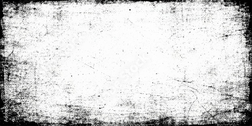 Aged black grunge background with a rough textured stone wall pattern and dirty gray concrete surface design for an old vintage paper backdrop