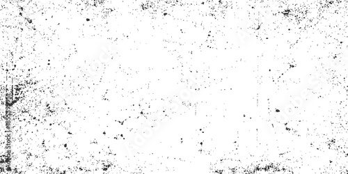 Black and white grunge background featuring paint splashes and wet ink drops on an old textured glass surface with a dirty rain pattern and dust