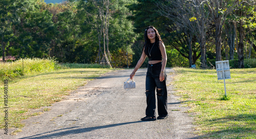Thai Girl at Resort and Gardens in Thailand