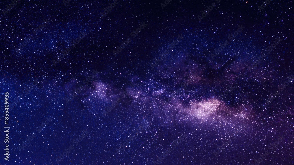 Fototapeta premium milkway. Starry night sky showcasing the Milky Way galaxy with deep blue tones and countless sparkling stars. travel magazines, destination branding, designed for outdoor magazines and nature guides.