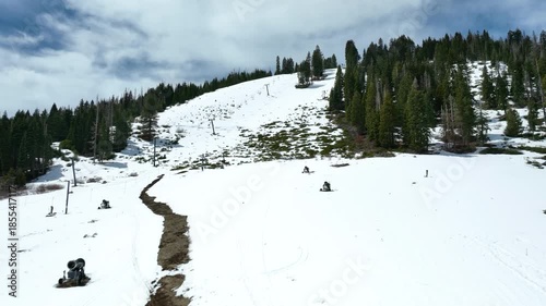 Aerial view over the snowy ski slopes of Homewood Mountain resort, winter in Tahoe