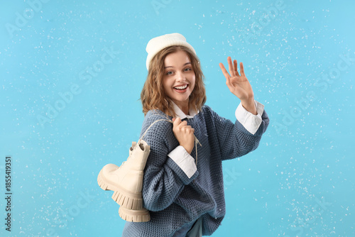 Stylish young woman with wi...