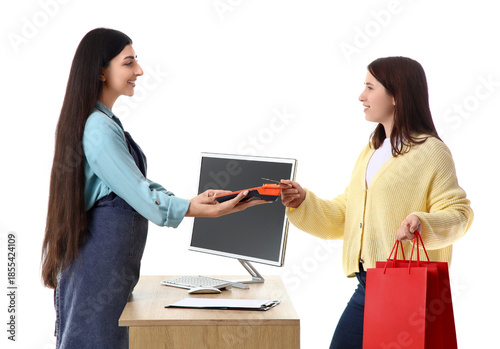 Female cashier receiving pa...