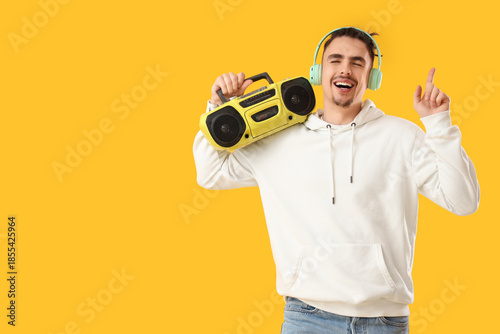 Happy young man with retro ...