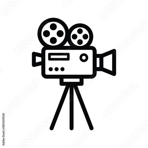 Old fashioned movie camera on tripod