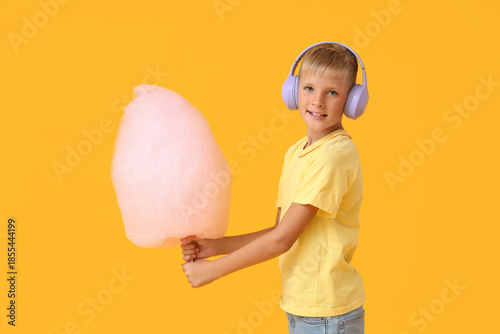 Teen boy with cotton candy ...