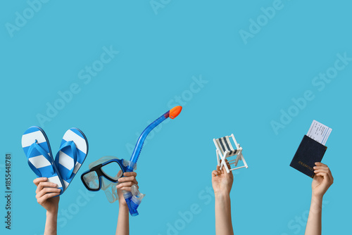Female hands with beach acc...