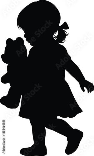 Silhouette of a small girl with a bow in her hair walking while hugging a beloved teddy bear toy against white background