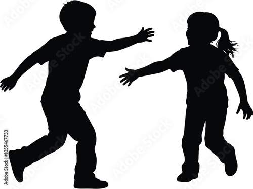 Silhouette of two happy children running towards each other with open arms ready for a joyful reunion or hug