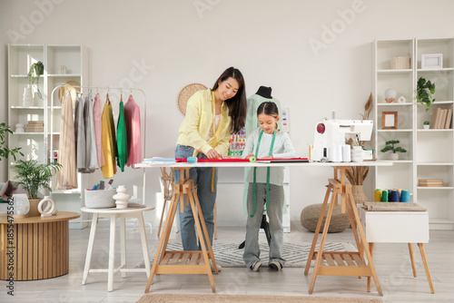 Happy Asian mother and her ...