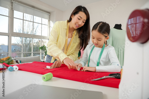 Happy Asian mother and her ...