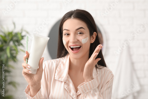 Surprised young woman with ...