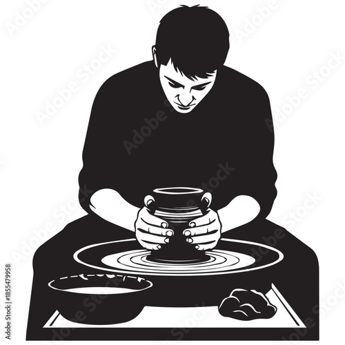 Potter crafting ceramic vessel on spinning wheel