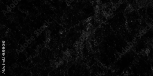 Dark charcoal grunge wall texture background. Dark black rough grunge surface with smoke edge. Black texture chalk board and black board.	