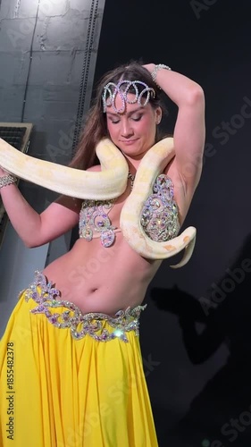 Exotic Dancer with Albino Python in Studio