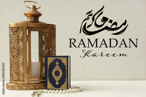 Fotografie Lantern with burning candle, Koran and prayer beads on white grunge background