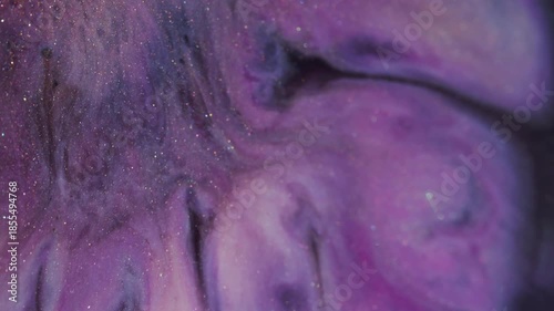 Blur acrylic wave. Glitter paint texture. Defocused purple pink golden colorful bubble wet pigment spatter flow on abstract background.