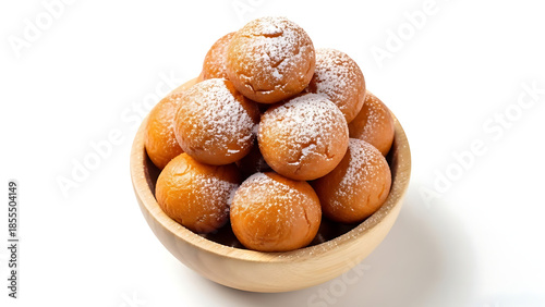 A wooden bowl filled with golden-brown fried dough balls dusted with powdered sugar on a white studio background.