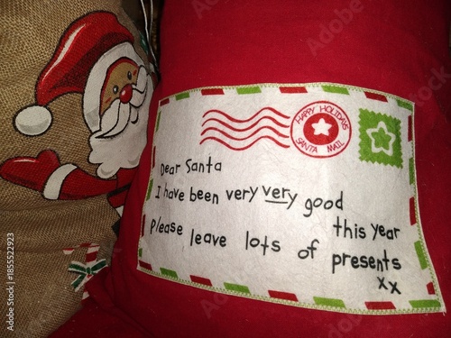 Christmas Letter to Santa on a Gift Sack Full of Presents