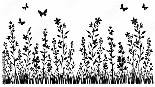 Black silhouette of flowers and butterflies in a field