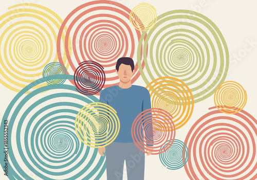 Man stands amidst colorful swirling circular patterns.