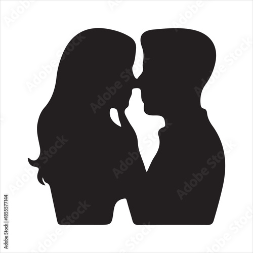 Silhouette of a romantic couple in a passionate embrace about to kiss