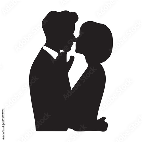 Silhouette of a romantic couple in a passionate embrace about to kiss