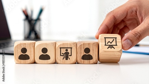 Wooden blocks with icons on desk