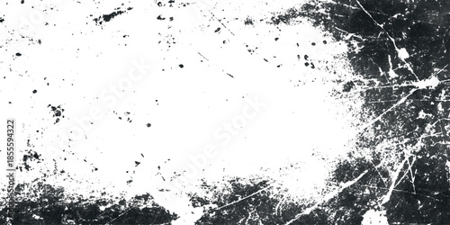 A stark monochromatic image featuring a fractured textured surface with prominent scratch marks and white space