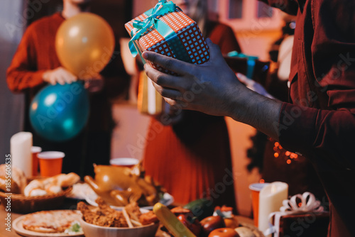 Festive Office Christmas Party with Delicious Food. A beautifully decorated office space with Christmas trees and festive lights, set up for a holiday party.