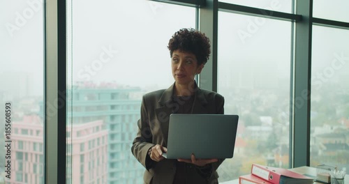 Remote facilitator conducting session with city view backdrop