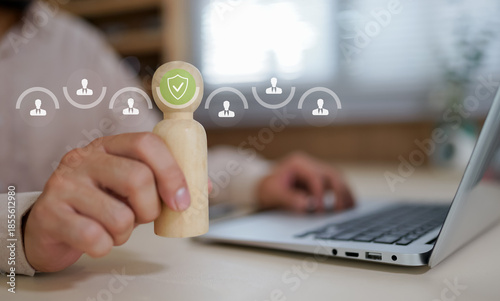 Businessman selecting employee on virtual screen for recruitment, human resources management, or candidate evaluation in digital hiring process. Concept of HR technology and workforce optimization.