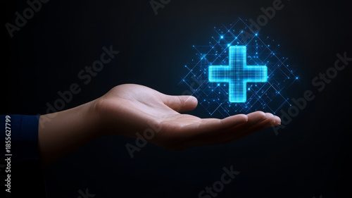 Hand glowing plus icon digital technology healthcare blue hand holding glowing blue plus icon