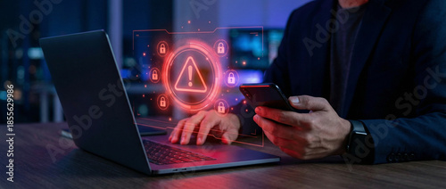 Cyber Security Breach Alert on Laptop and Smartphone Featuring Red Warning Icons and Locks