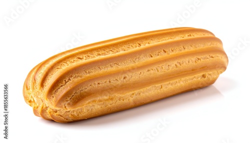 Single ?clair pastry on white, with ridged top, casting a slight shadow