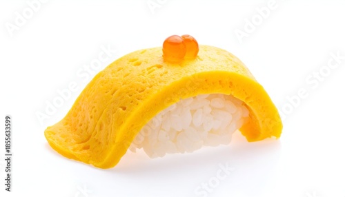 Single piece of Japanese sushi with egg and fish roe atop white rice